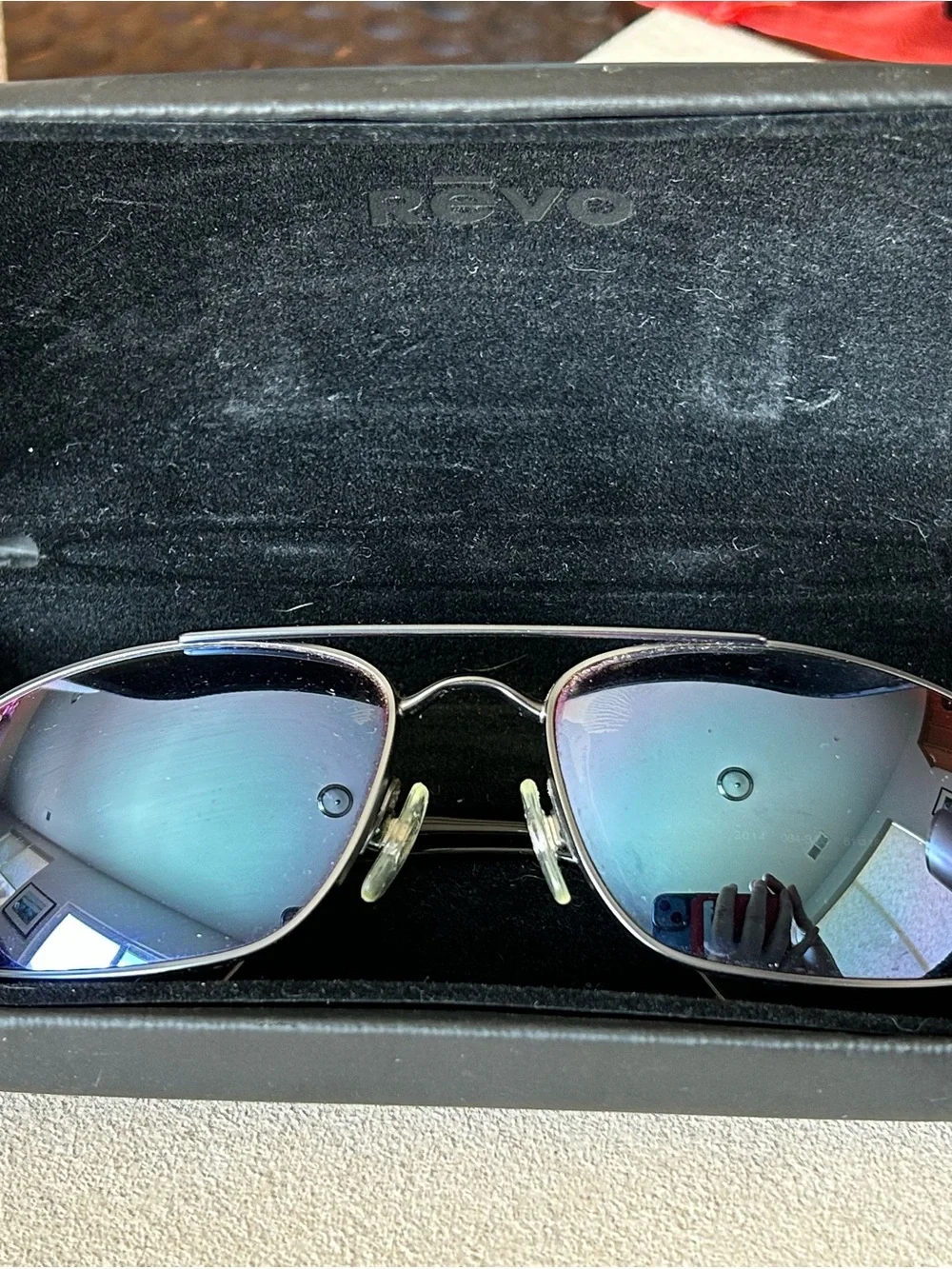 Revo Polarized Sunglasses — Black Frame with Blue Logo